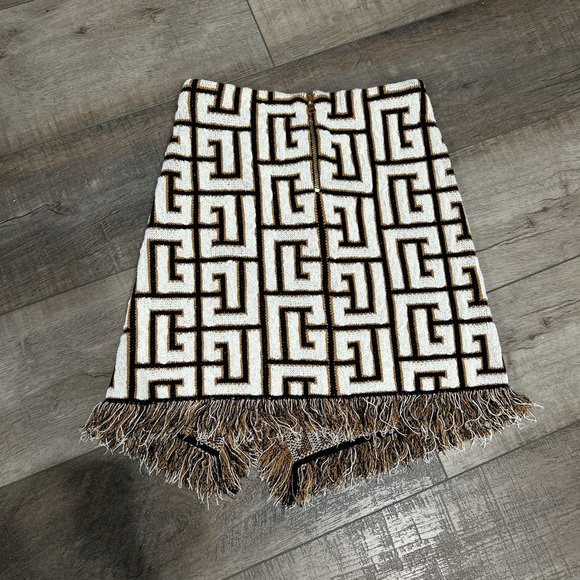 Balmain wrap effect fringed monogram knit logo mini skirt in noir and naturel - Picture 7 of 9